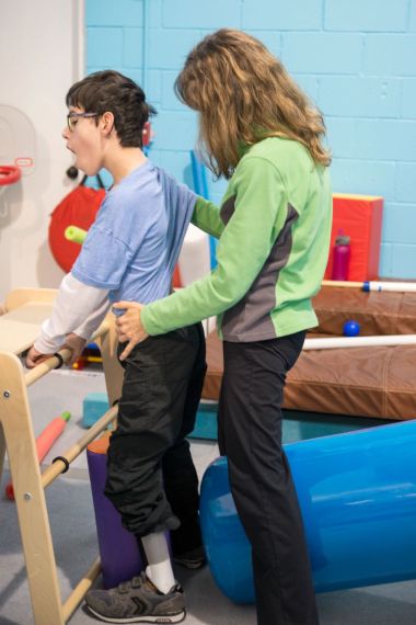 Two Kids Standing on Playing Room